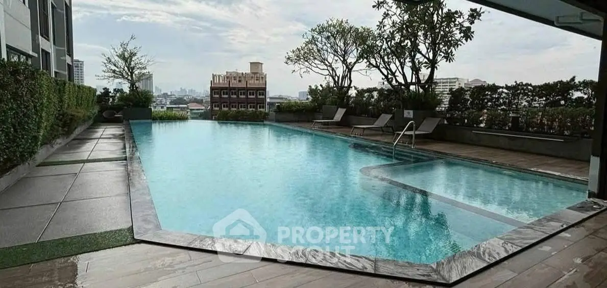 Luxurious rooftop pool with city skyline view and modern design