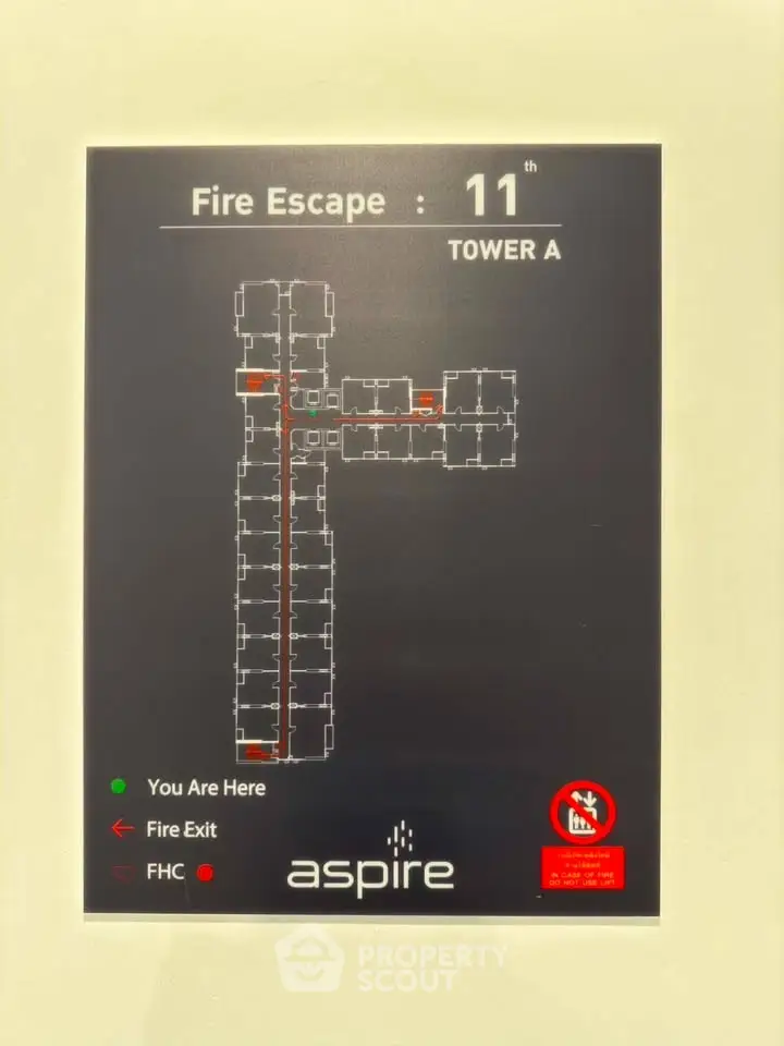 Fire escape plan for 11th floor Tower A at Aspire, highlighting exits and safety points.