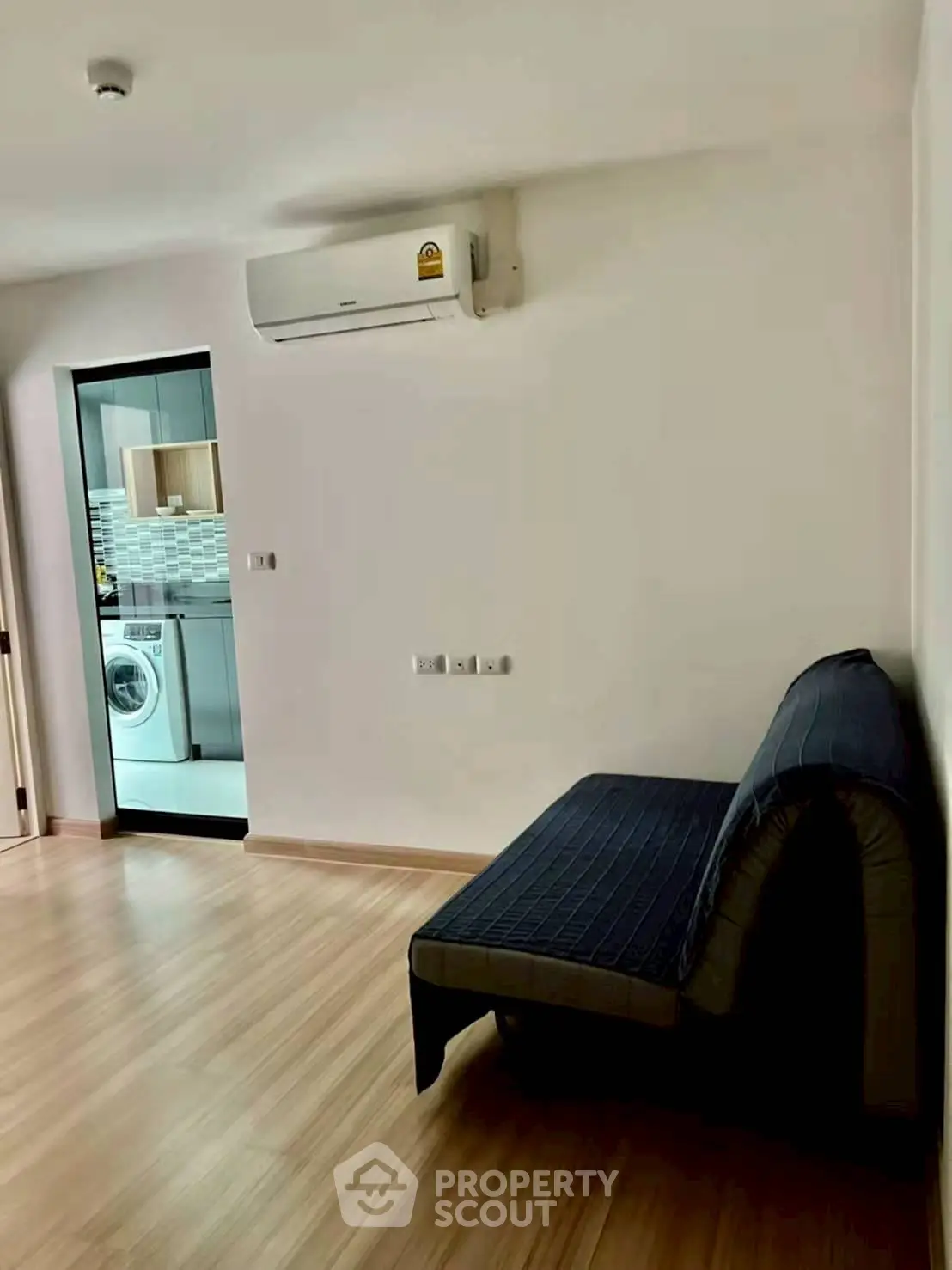 Modern apartment with air conditioning and washing machine in open layout