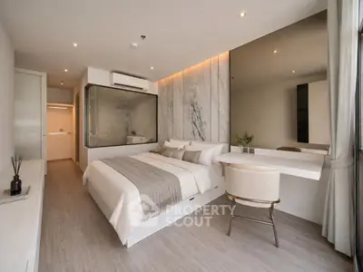 Luxurious modern bedroom with elegant decor and large window view