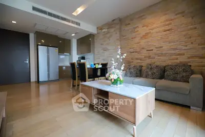 Spacious modern living room with stylish decor and open kitchen layout