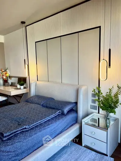 Luxurious bedroom with modern decor and elegant lighting