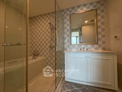 Luxurious bathroom with elegant tile design and modern fixtures