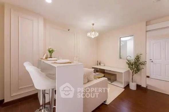 Elegant living room with modern decor and breakfast bar seating