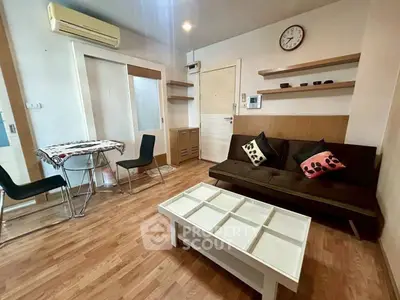 Cozy living room with modern furniture and wooden flooring