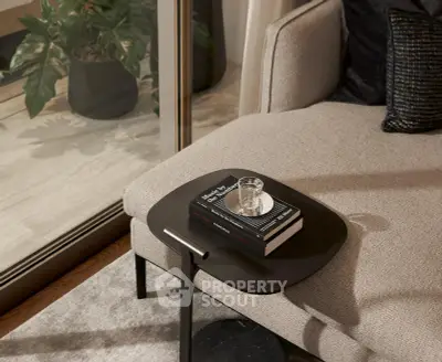 Stylish modern living room with elegant furniture and indoor plants, perfect for cozy relaxation.