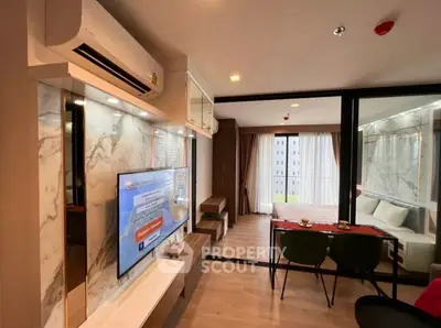 Modern living room with stylish decor and balcony view