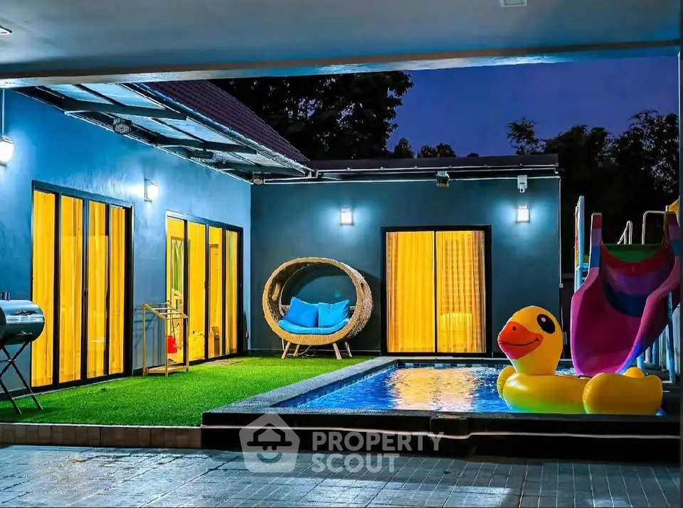 Charming modern home with private pool and stylish outdoor seating area, perfect for relaxation and entertainment.