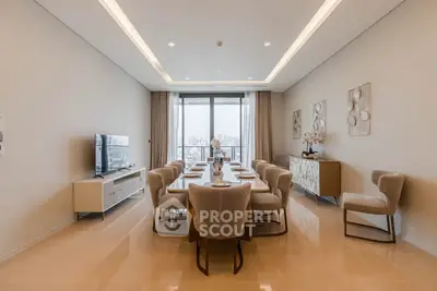Luxurious dining room with elegant decor and city view, perfect for entertaining guests.