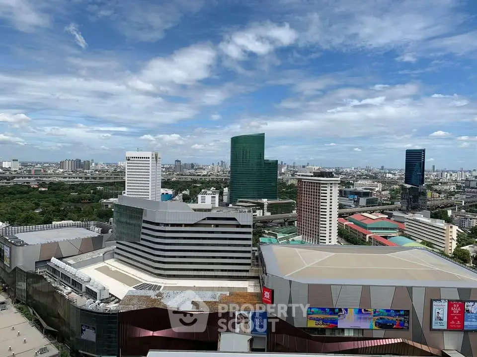 Stunning cityscape view from high-rise building showcasing modern architecture and vibrant skyline.