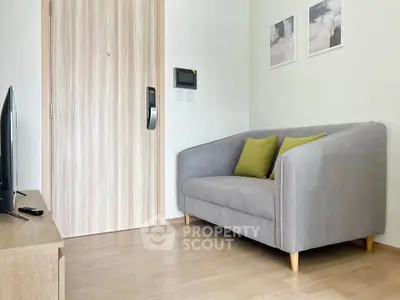 Cozy living room with modern sofa and wooden flooring