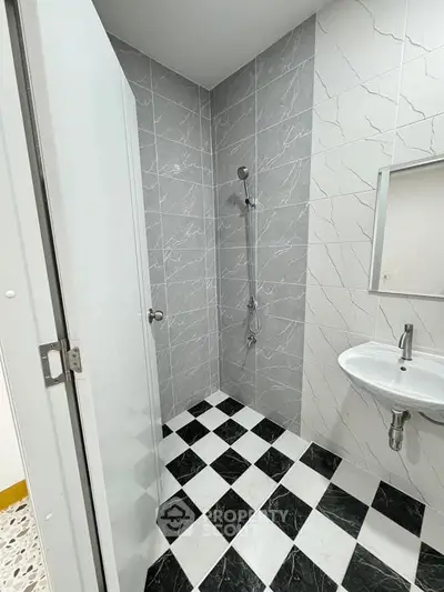 Modern bathroom with sleek tiles and minimalist design