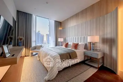 Luxurious modern bedroom with city view, elegant decor, and cozy ambiance.