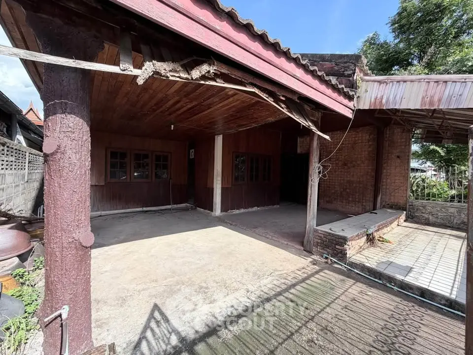 Charming rustic exterior with wooden accents and spacious patio, perfect for outdoor gatherings.