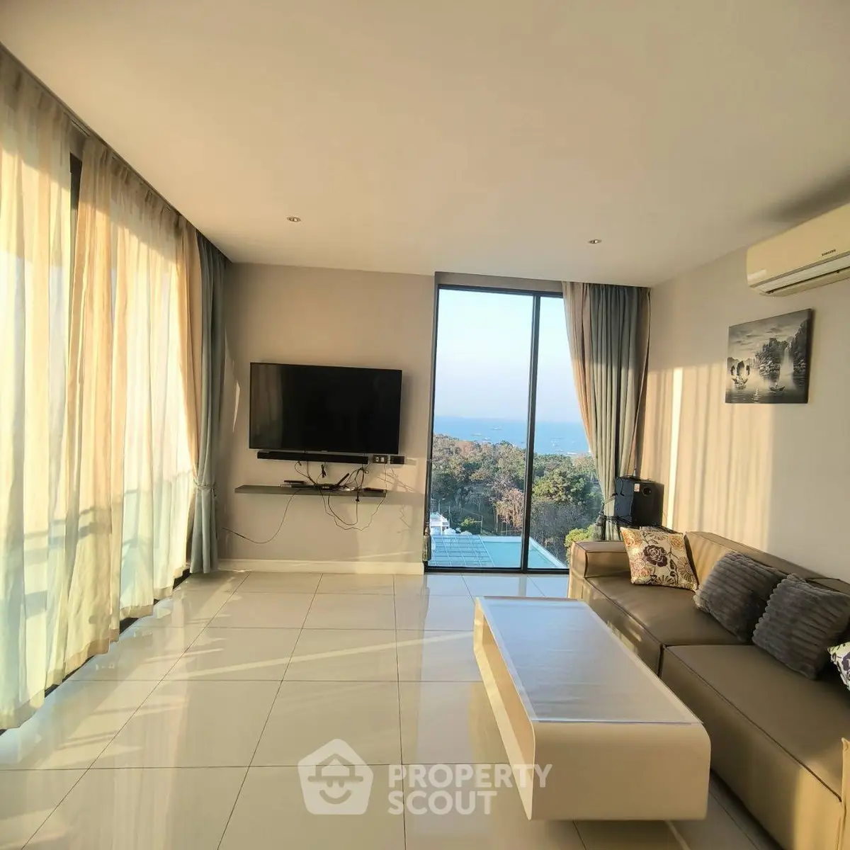 Spacious living room with stunning view and modern decor in luxury apartment