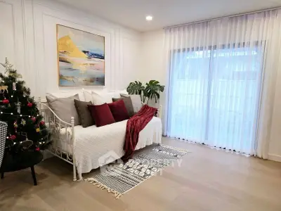 Charming living room with cozy decor and natural light