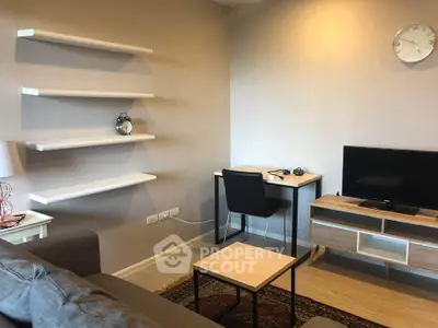Modern living room with sleek furniture and wall-mounted shelves, perfect for a cozy and stylish home.