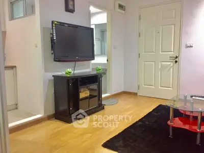 Modern living room with sleek TV setup and stylish decor