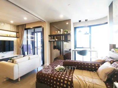 Modern studio apartment with open layout, featuring cozy living area and stylish decor.