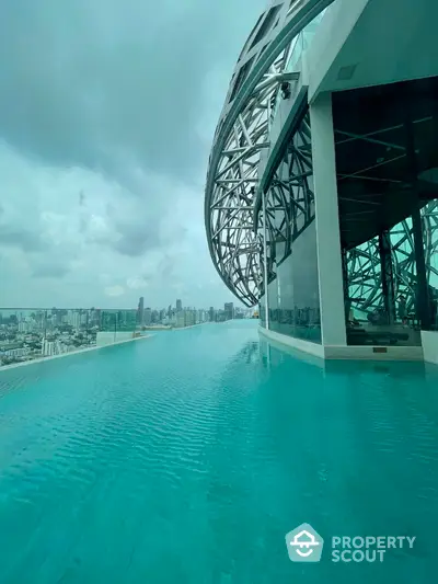 Stunning rooftop infinity pool with panoramic city skyline view