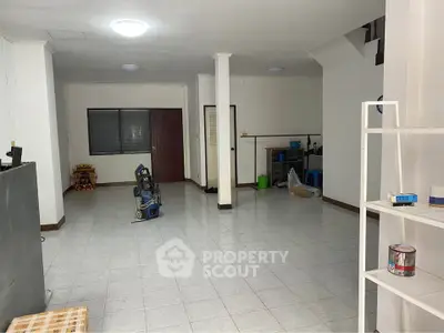 Spacious interior with tiled flooring and open layout, ideal for customization and versatile use.