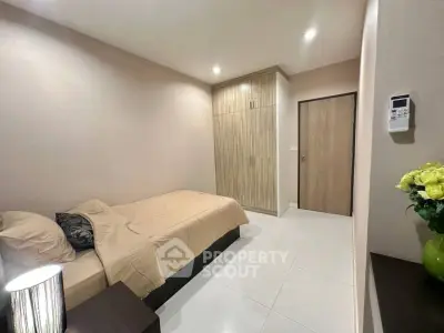 Cozy bedroom with modern decor and built-in wardrobe