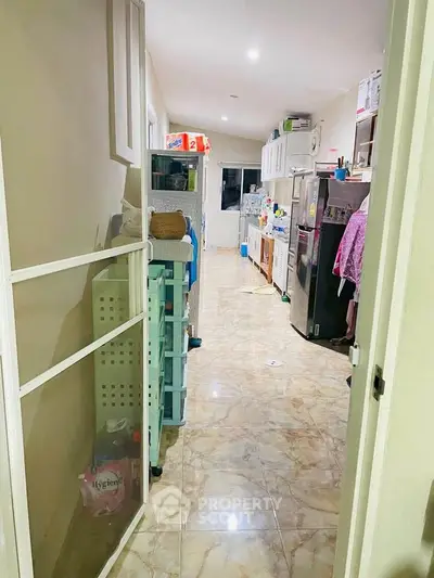 Spacious kitchen with modern appliances and ample storage space