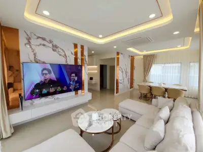Luxurious modern living room with marble accents and elegant lighting