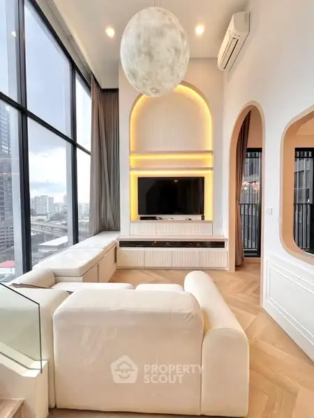 Luxurious modern living room with floor-to-ceiling windows and city view