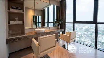 Luxurious high-rise apartment with stunning city view and modern interior design.