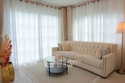 Elegant living room with plush sofa and modern decor