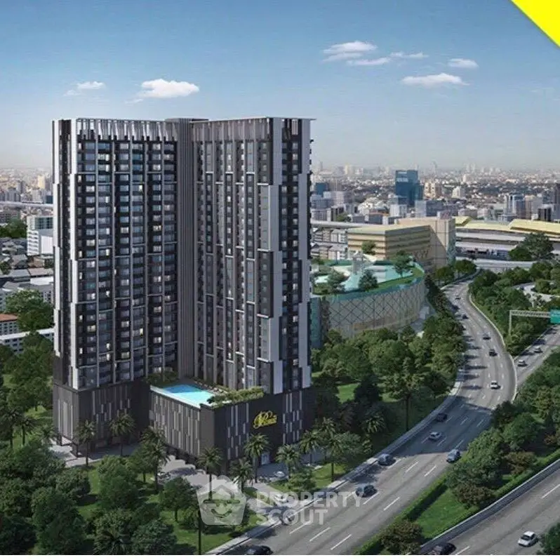 Modern high-rise building with pool and city view, ideal for urban living.