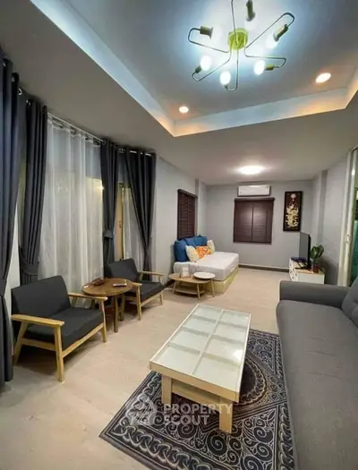 Stylish living room with modern furniture and elegant lighting