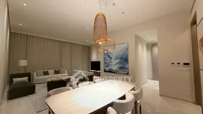 Luxurious modern living room with elegant dining area and stylish lighting