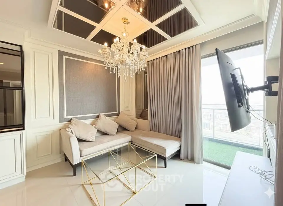 Luxurious living room with chandelier and city view balcony