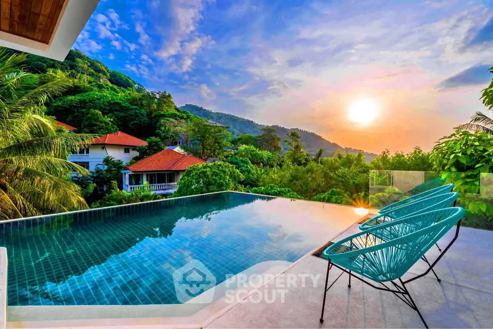 Stunning infinity pool with breathtaking mountain and sunset views