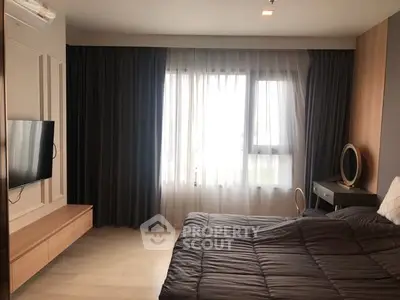 Modern bedroom with sleek design and natural light