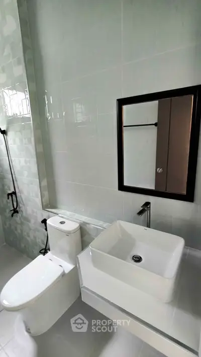 Modern bathroom with sleek fixtures and elegant design
