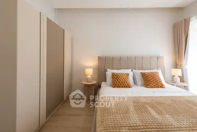Elegant bedroom with modern decor and cozy lighting