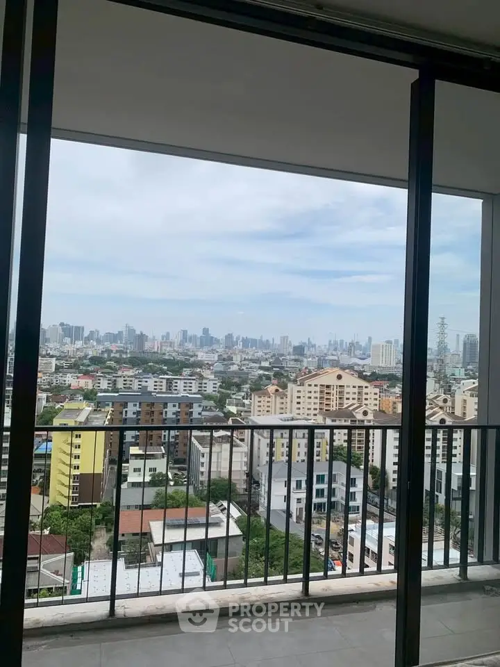 Stunning cityscape view from a high-rise balcony, perfect for urban living enthusiasts.