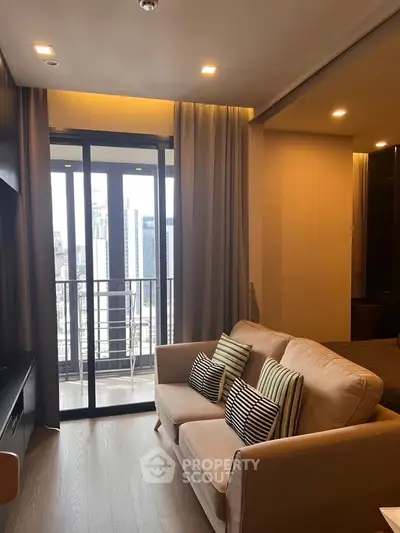 Modern living room with cozy sofa and city view balcony in luxury apartment.