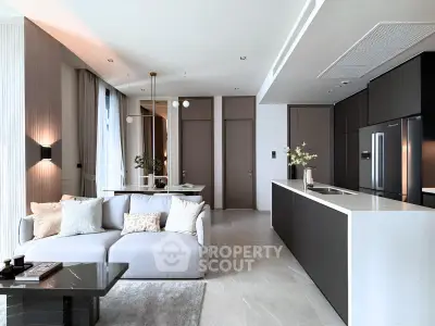 Luxurious modern living room with open kitchen, sleek design, and elegant decor