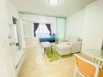 Bright and modern living room with open layout and cozy furniture