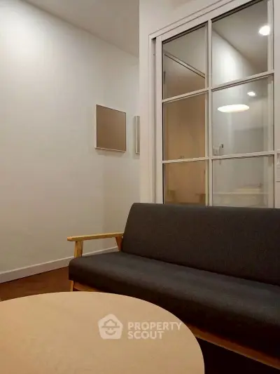 Modern living room with sleek sofa and minimalist decor