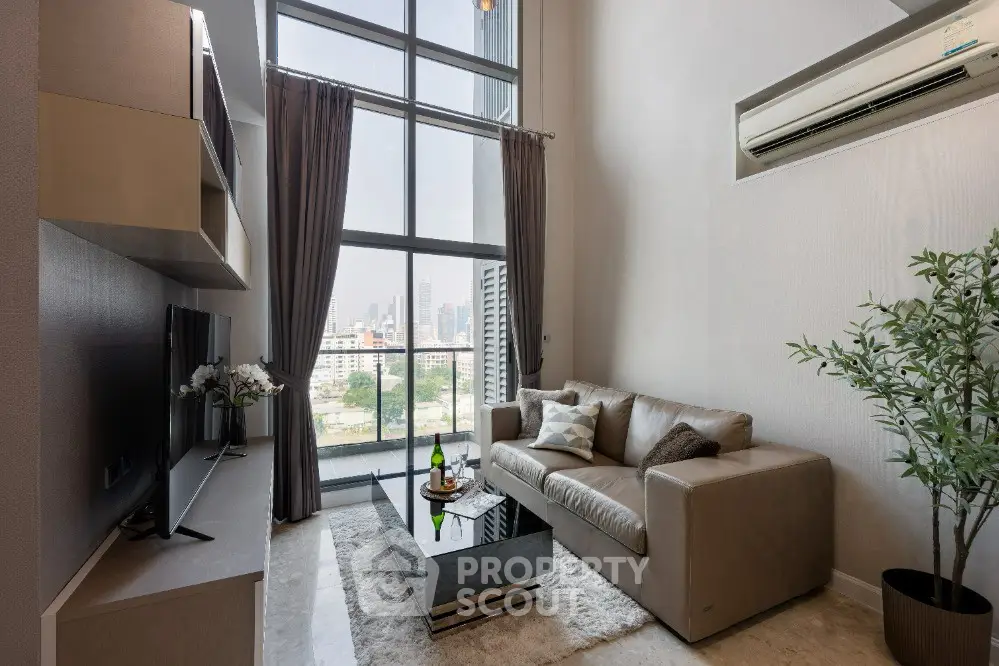 Luxurious high-rise living room with stunning city view and modern decor