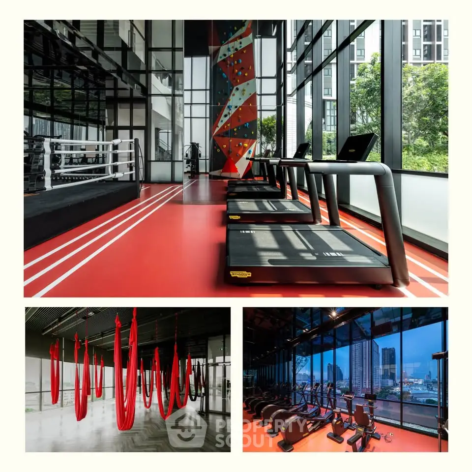 Modern gym with treadmills, boxing ring, and aerial yoga setup in a high-rise building.