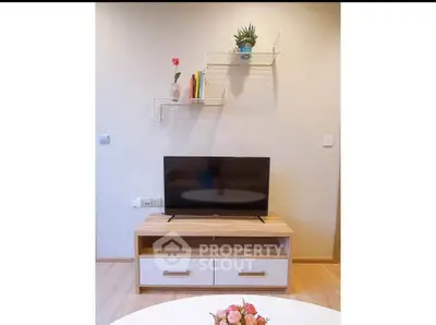 Modern living room with stylish TV stand and decorative shelves