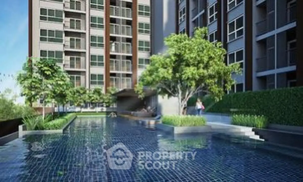Modern condominium with luxurious pool and lush greenery