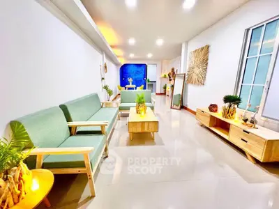 Spacious modern living room with stylish furniture and bright lighting