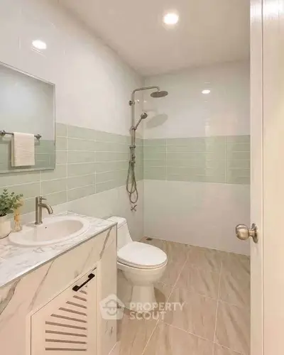 Modern bathroom with elegant fixtures and stylish tile design